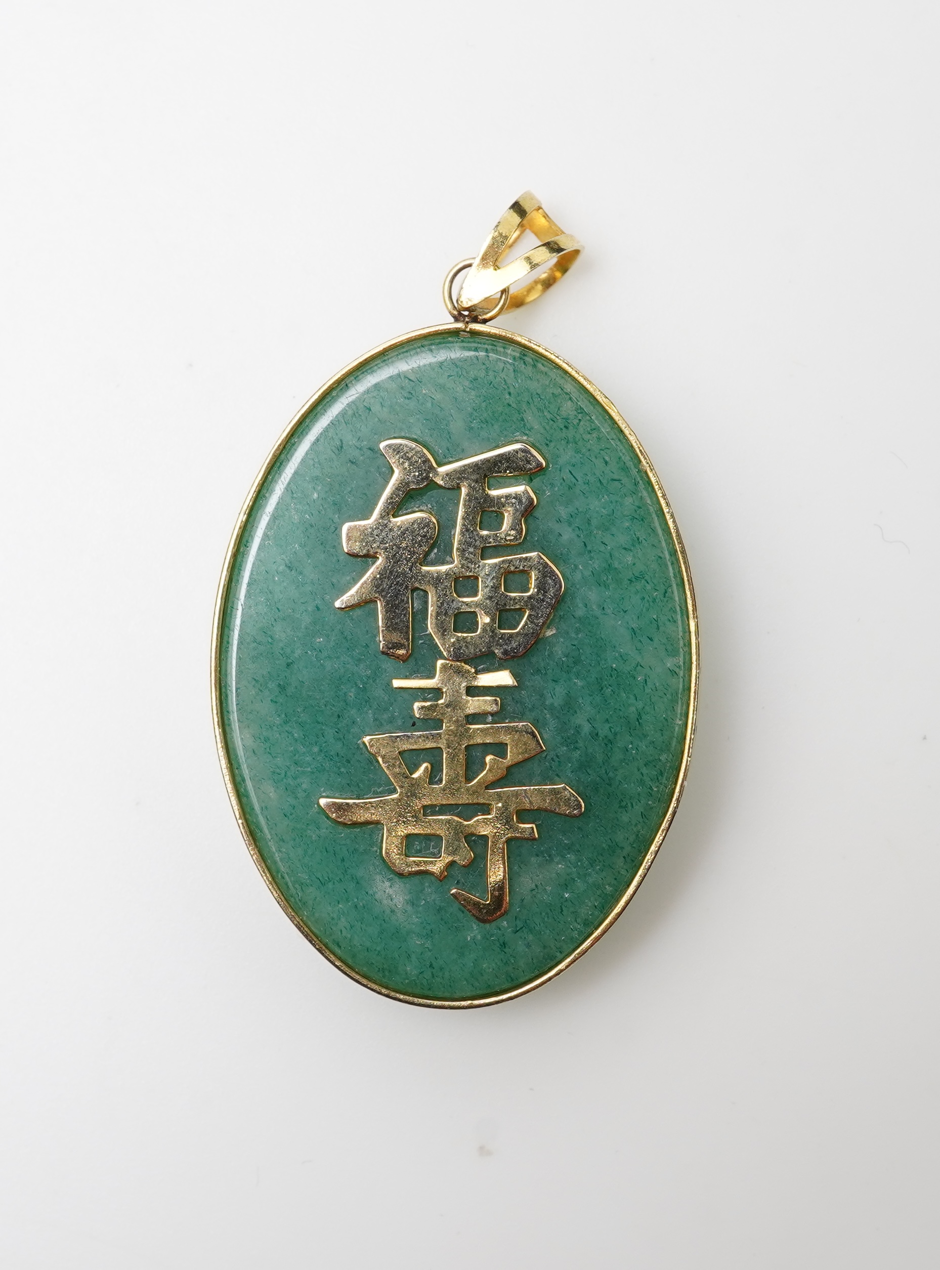 Two pendants and a pair of earrings